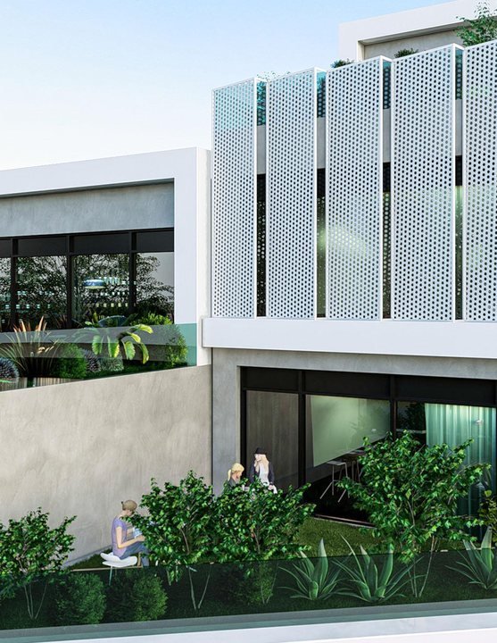Zaha Pyramid Office — terasta oturma alanı ve delikli cephe panoları